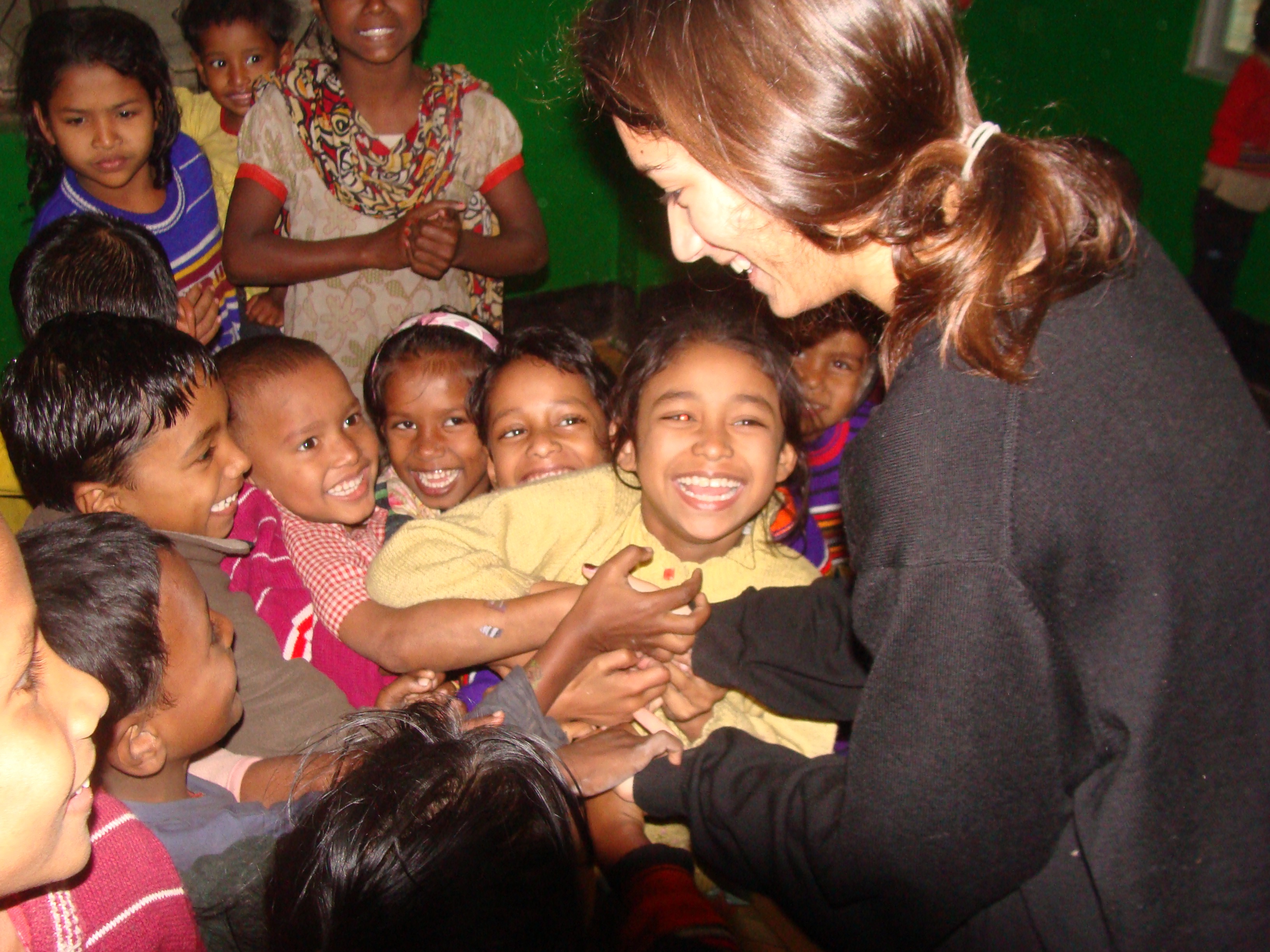 Sabera Talukder meeting children from the daycares for street children in Dhaka, Bangladesh.